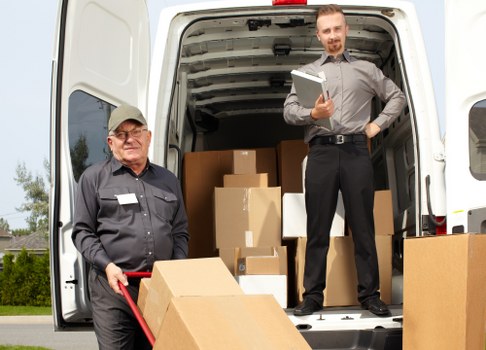 Careful loading of furniture and boxes into a removals van