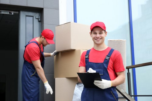 Moving crew unloading boxes at a new Woodlands property