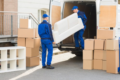 Local Woodlands moving van handling bulky household furniture