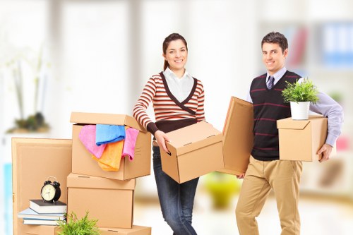 Packed household boxes and furniture ready for a move in Woodlands