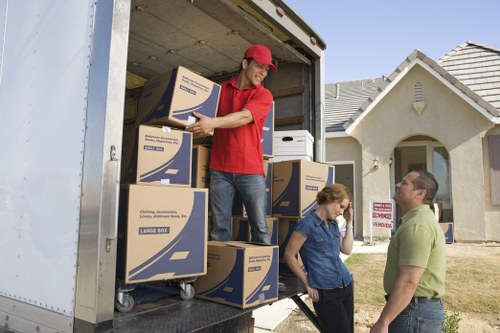 Packing and loading household items for a Woodlands home move