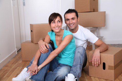 Moving team handling office furniture for a commercial relocation in Woodlands