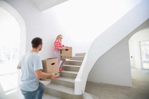 Furniture being carefully transported during a local relocation