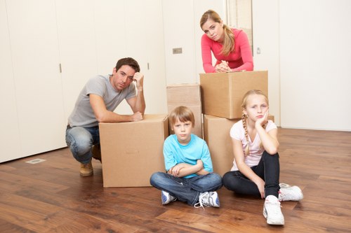 Loading furniture into a van for a move in Woodlands
