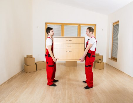 Packed office furniture and equipment prepared for a commercial move